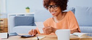 happy woman paying loans