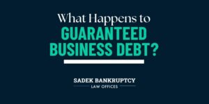 What happens to guaranteed business debt